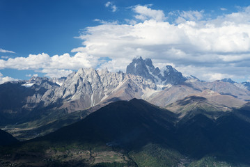 Mountainous landscape of Svaneti with peak Ushba in the clouds