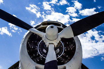 Black Propeller Against a Blue Sky