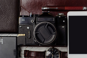 Notebook clock mobile phone tie flash drive photo camera wallet