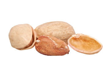 Salted pistachio nuts on a white background