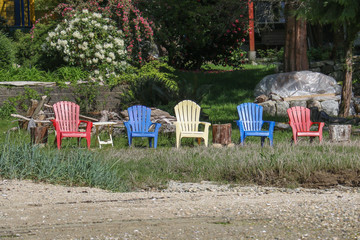 Colorful adirondack chairs offer a relaxing spot for quite meditation