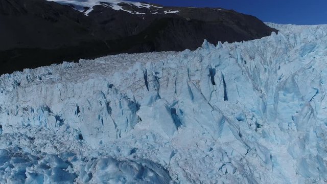 Arial 4k shots of a glacier and it's surroundings in Alaska