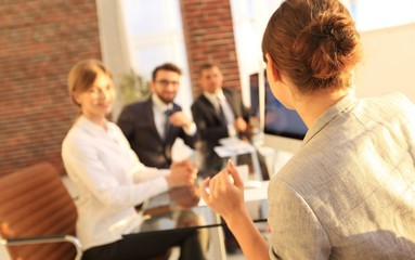 business woman conducts a workshop with the business team