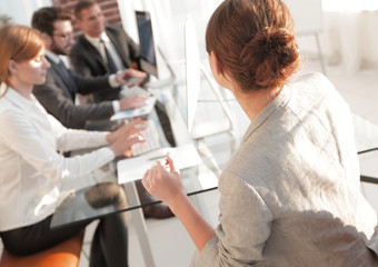 business woman conducts a workshop with the business team