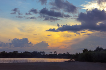 Sunset on the river bank.