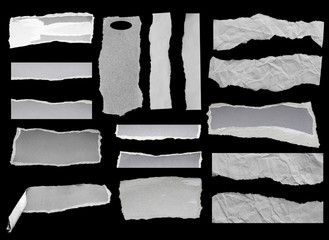 Ripped paper on black background, space for advertising copy.