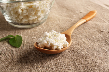cottage cheese in a glass bowl on the fabric