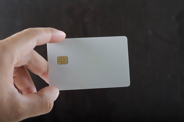 Close up of woman hand holding business card.