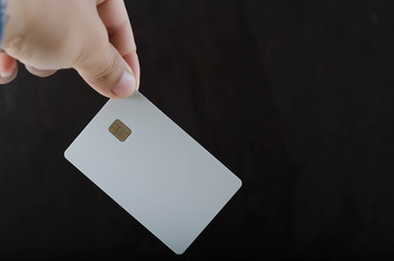 Close up of woman hand holding business card.
