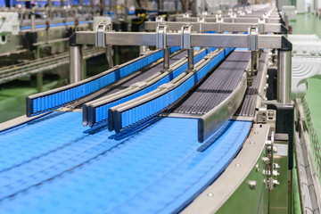 Fototapeta na wymiar Empty conveyor belt of production line, part of industrial equipment