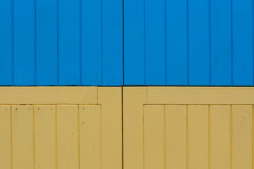 Blue and yellow wooden planks background
