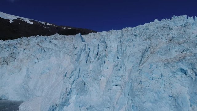 Arial 4k shots of a glacier and it's surroundings in Alaska