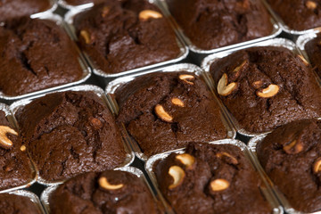 Thai bakery method baking chocolate brownie cake in pan