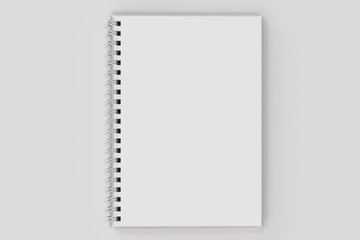 Opend notebook spiral bound on white background