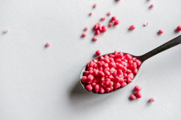 Spoonful of pink candy