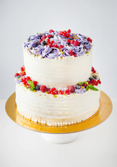 cake with fresh berries and cream