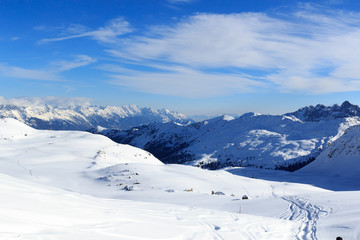 Fototapeta na wymiar Mountain panorama with snow and ski tracks in winter in Stubai Alps, Austria