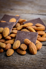 chocolate with almond on wooden