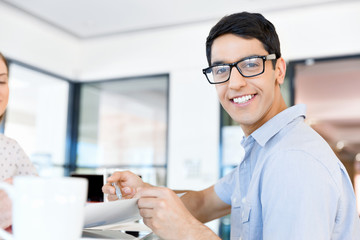 Young man in casual in office