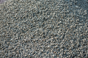 Rock gray crushed for construction on the ground : Crushed grey stone texture background Rock textured. coarse aggregate 
