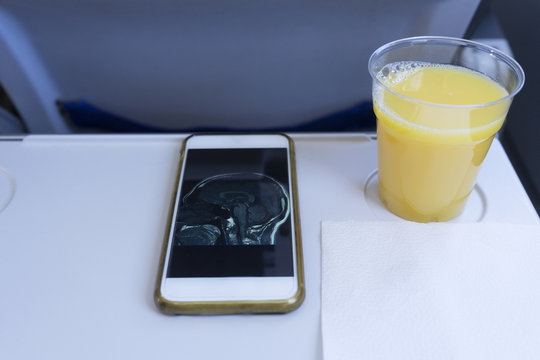 cellphone and orange juice