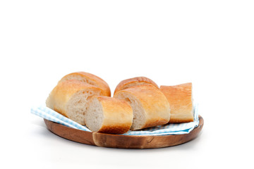 a slice of french bread on wooden plate
