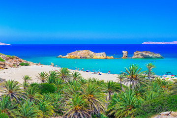 Scenic landscape of palm trees, turquoise water and tropical beach, Vai, Crete, Greece.