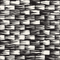 Vector seamless pattern with brush stripes and strokes. Black and white background with ink elements. Hand painted grunge texture.