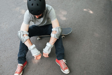 Professional skater has bad day in competition, crash and failure on training, exhaustion and refreshment concept © golubovy