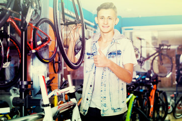 Fototapeta na wymiar teenager choosing new bicycle