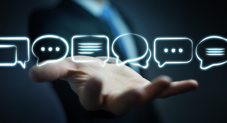 Businessman holding discussion icons sketch