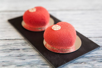 Red mousse heart cakes