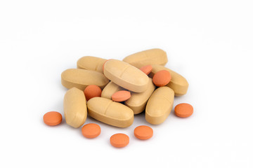 Fototapeta na wymiar pills stacked isolated on white. Healthcare background.