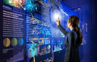 Network administrator in server room.