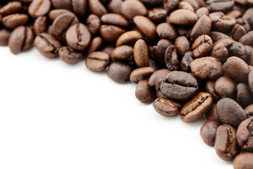 roasted coffee beans with copy space on white background