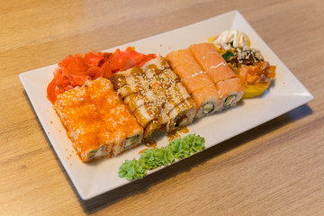 Fresh and delicious set of sushi on table in cafe