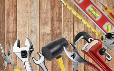 set of tools in toolbelt tape measure nippers djustable wrench pliers pencil hammer cutter