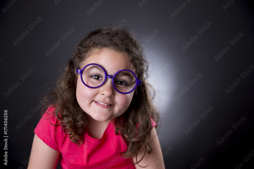 Wall mural little girl and glasses