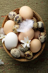 Fototapeta na wymiar Easter basket with eggs top view
