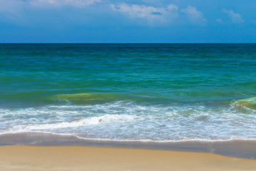 Fototapeta na wymiar Green water in the sea on the beach.