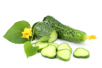 cucumber with sliced cucumber and leaf isolated on white background