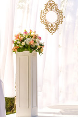 floral wedding decorations pink and white. Garland, candle, lace, bouquet