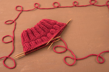 Background with red knitting
