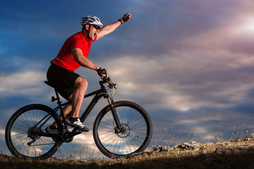 Traveler ride a bike on autumn background