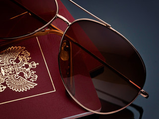Travel tourism concept sunglasses passport on  gray background  gradient.