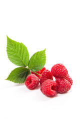 Ripe raspberries with leaf isolated on white background.