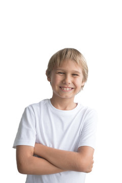 Smiling kid with crossed arms wearing white t-shirt on white background