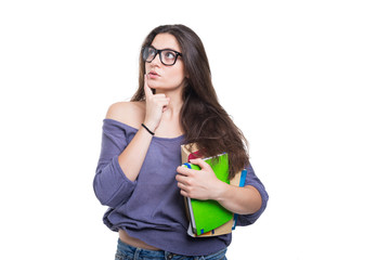 Girl student holding a book in her hand thinking