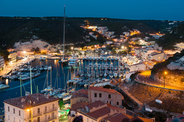 Fototapeta premium Marina at night, historic city of Bonifacio, Corsica island, France