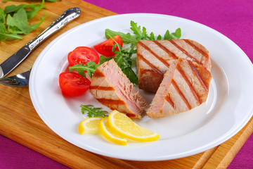 tasty grilled tuna steak with strips